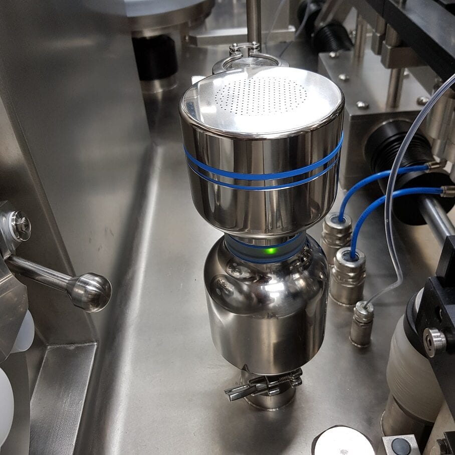 Microbial air sampler installed in isolator with LED status indicator – professional air monitoring